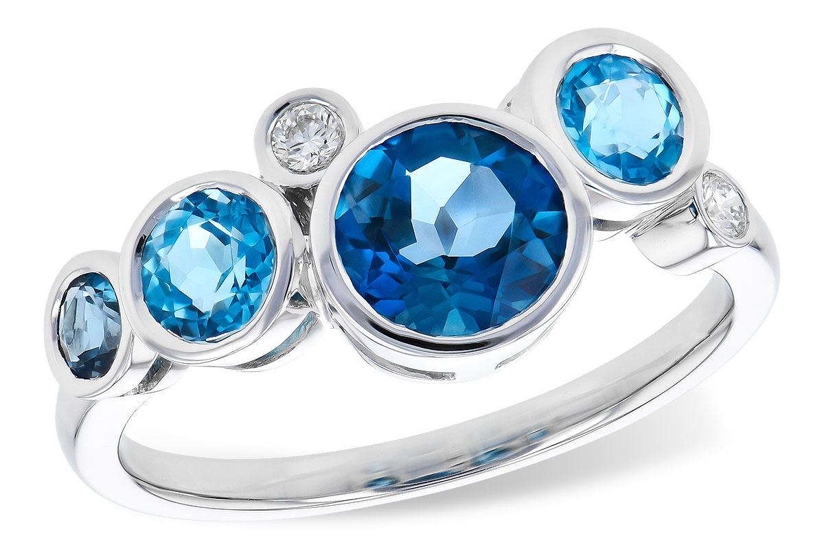 F328-06524: LDS RG 1.40 TW BLUE TOPAZ 1.45 TGW