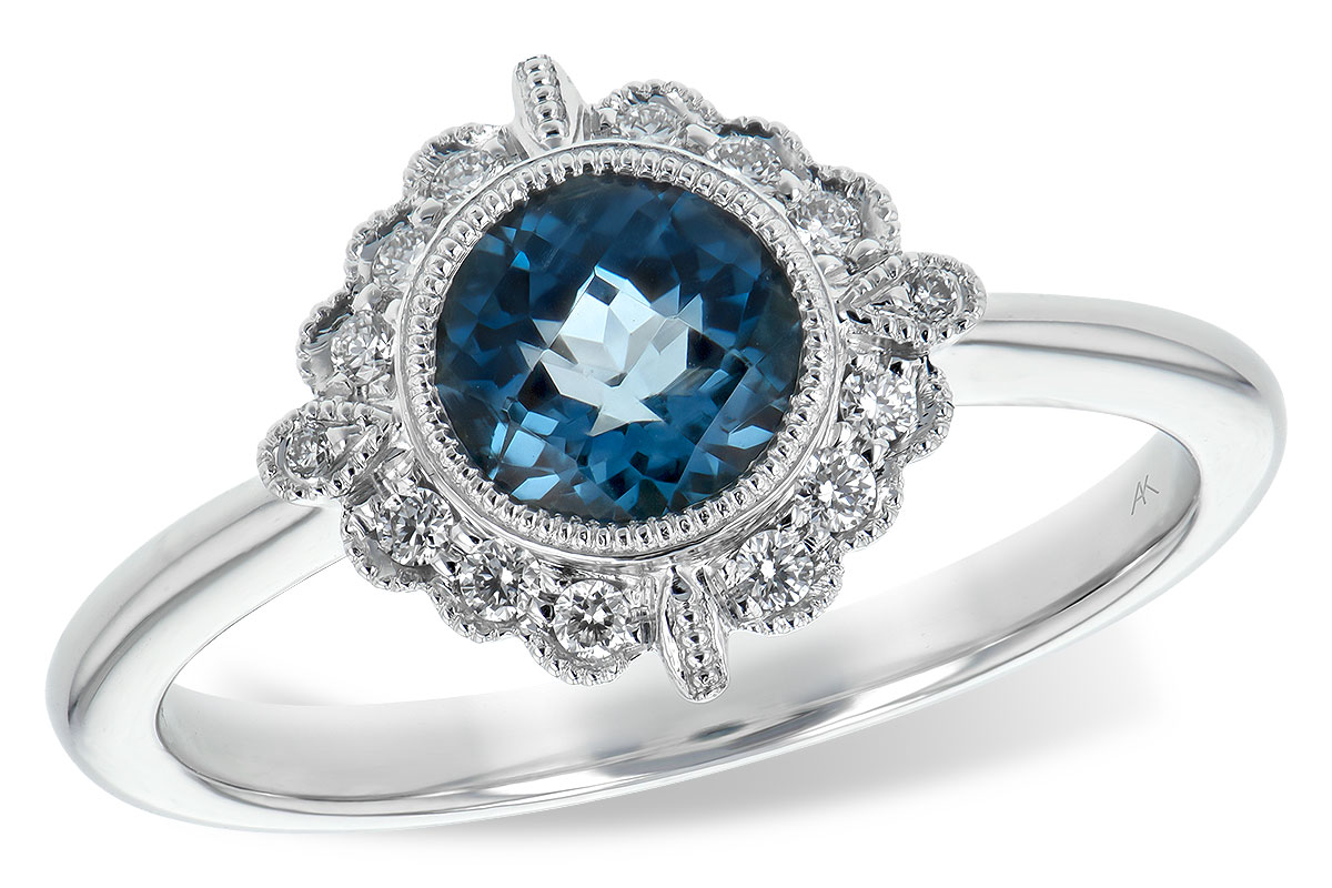 H244-37396: LDS RG .93 BLUE TOPAZ 1.05 TGW